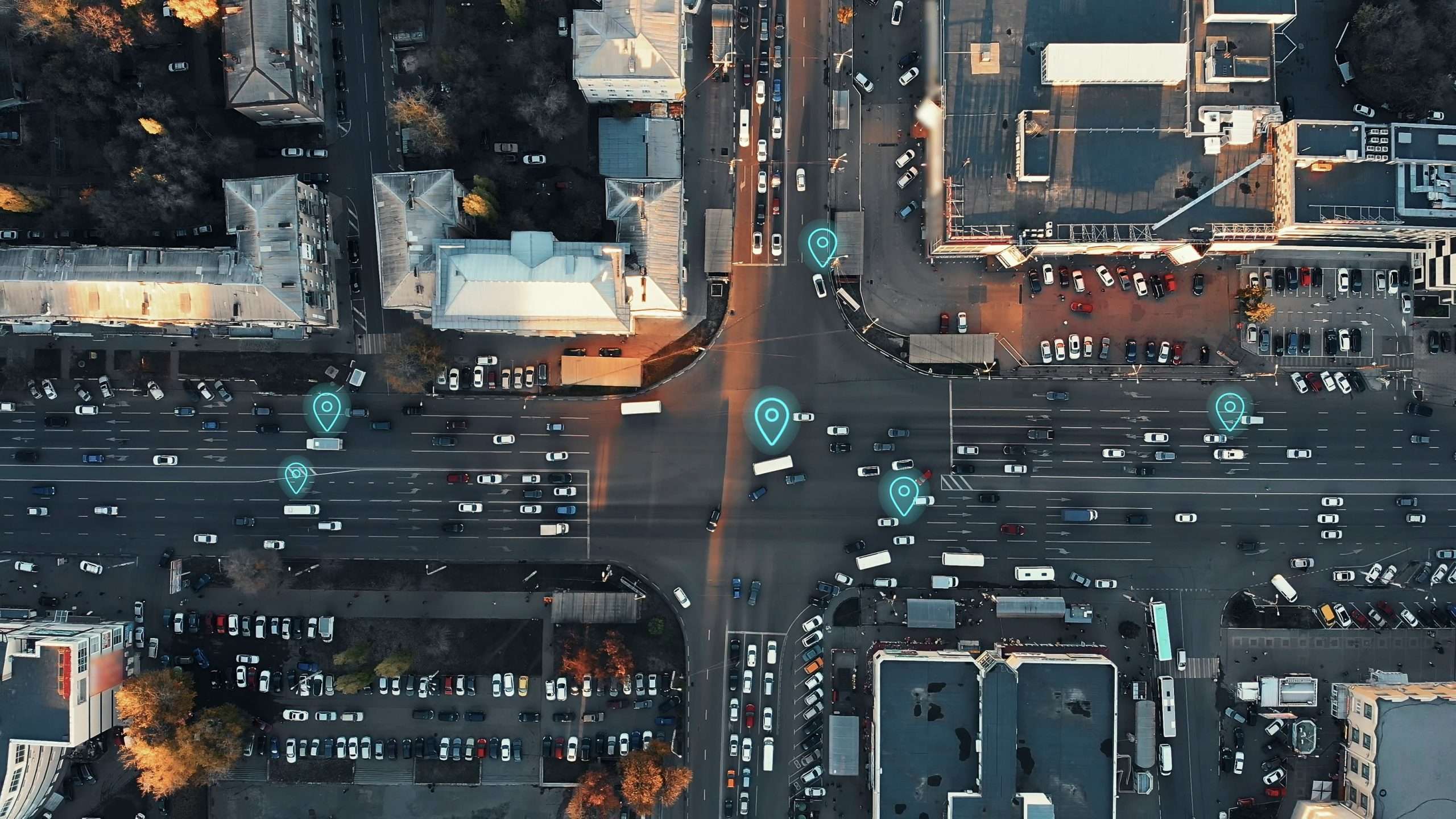 Aerial view of city intersection with many cars and GPS navigation system symbols. Autonomous driverless vehicles in city traffic. Future transportation ... By DedMityay